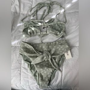 Brand new montce swim suit. Top medium bottoms small